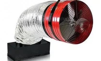 Ceiling-mounted whole-house fan grille in a bright hallway